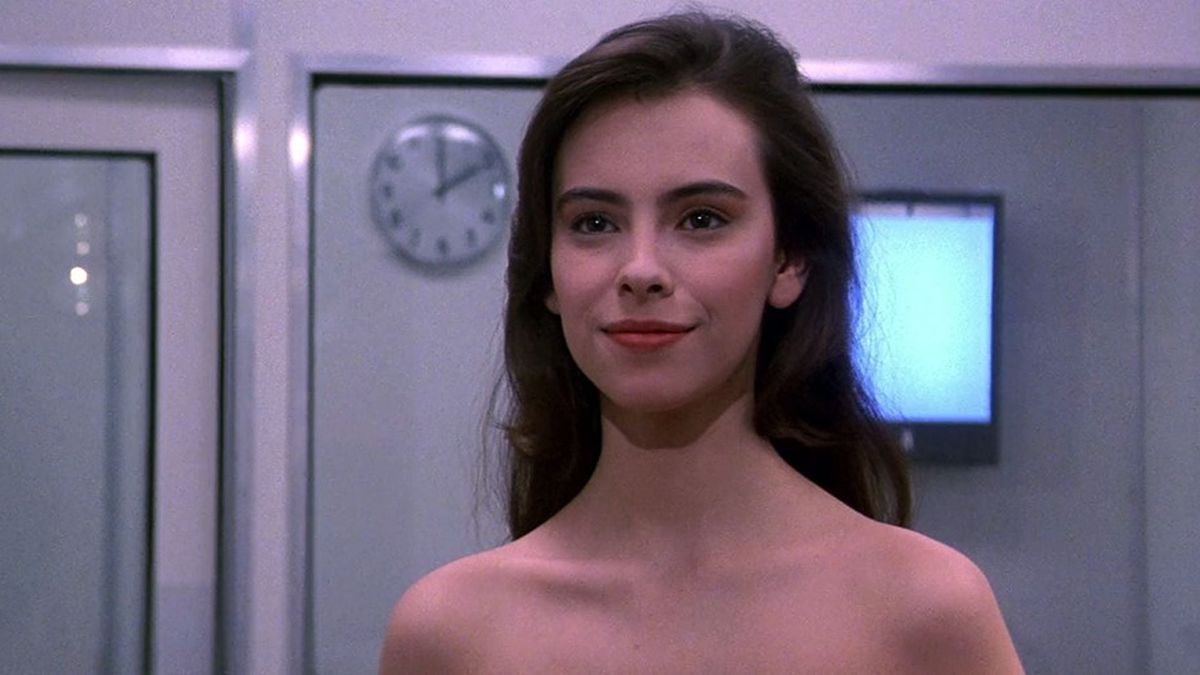 Mathilda May smiles while appearing naked in Lifeforce