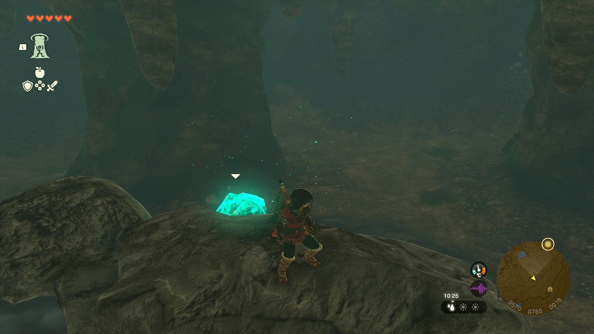 Link rides on the back of a Stone Talus in Crenel Hill Cave in Zelda Tears of the Kingdom.