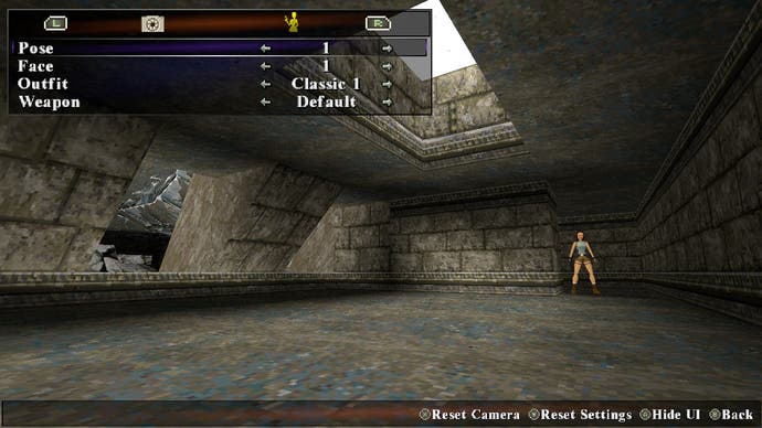 Lara stands triumphantly at a cliff's edge in this screen from Tomb Raider Remastered